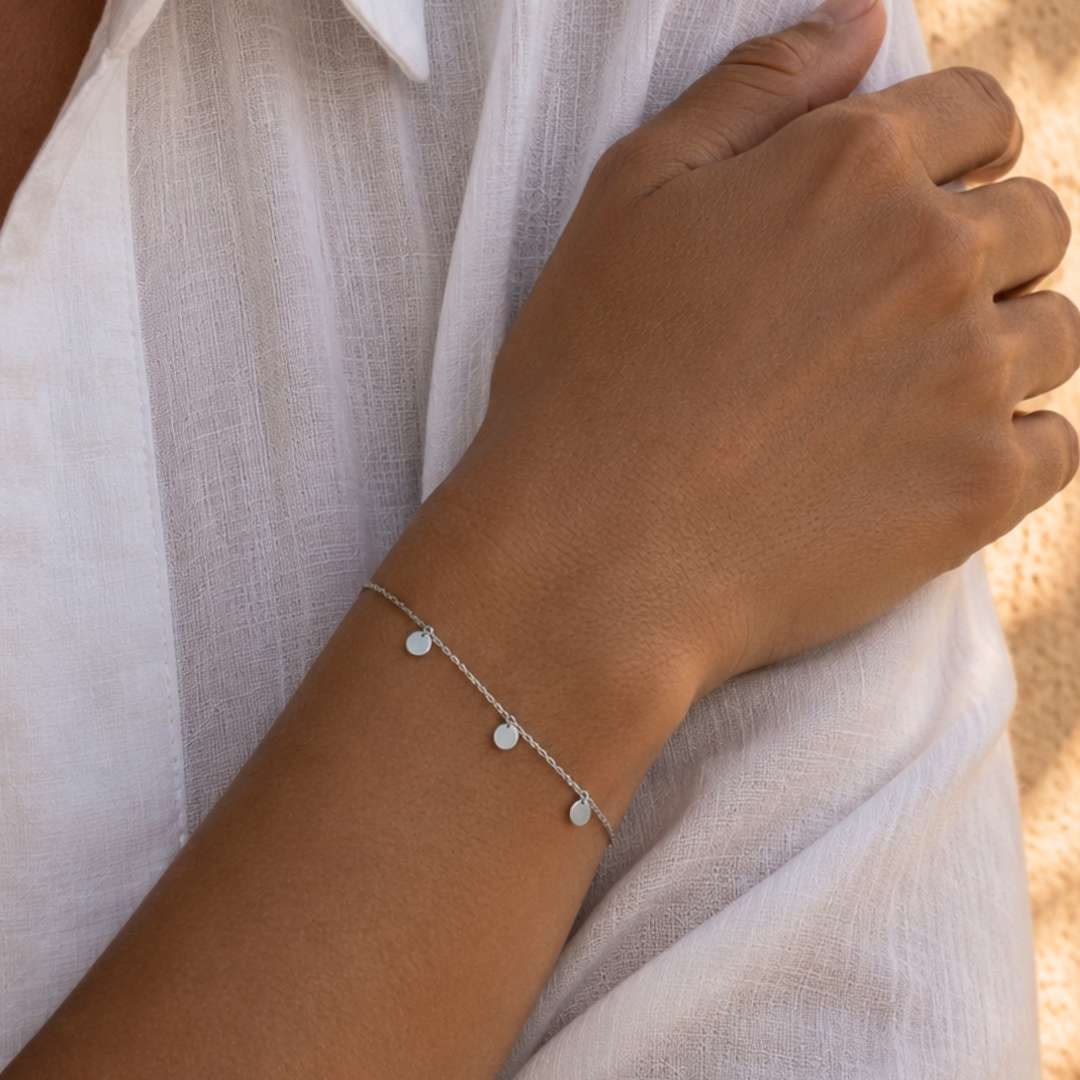 Armband met bedels zilver muntjes