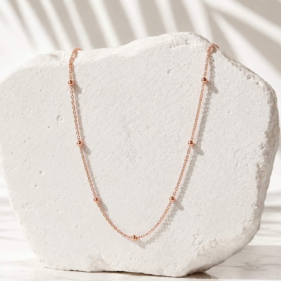 Bolletjes ketting rosé goud