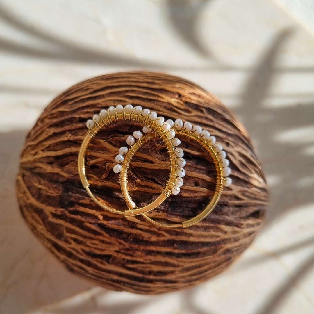 Gouden hoop oorbellen met parels van verguld zilver