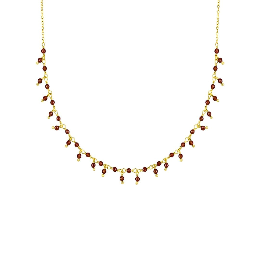 Gouden ketting met rode steentjes edelsteen