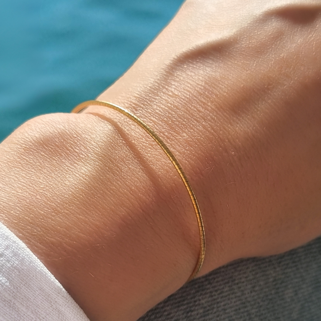 Roca de Piña- Metallic twist bracelet- goldplated 925 sterling silver - lightweight - armband goud zilver