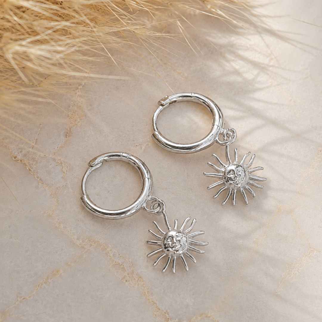 Zilver Oorbellen met zon hanger