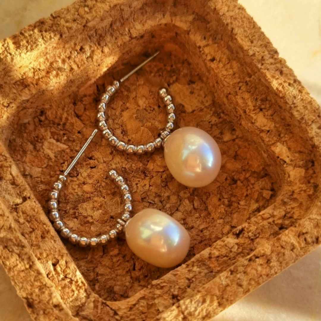 Zilver oorbellen met grote parels