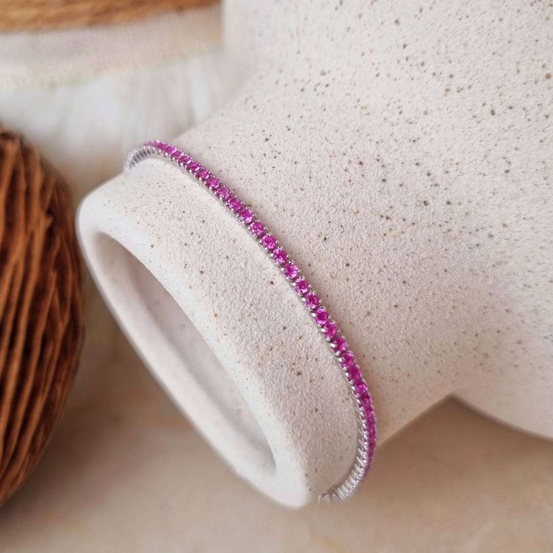 Zilveren tennisarmband met roze steentjes vrouw