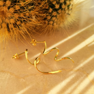 Ania Twirl gouden oorbellen spiraal 18k, verguld zilver