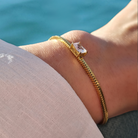 Roca de Piña- Alejandra bracelet - stainless steel gold colour -white zirconia - elegant - Armband RVS zirkonia