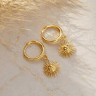Gouden Oorbellen met zon hanger verguld zilver