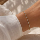 Gouden Tennisarmband vrouw 1mm met witte steentjes