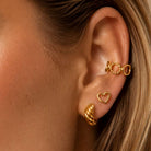 Gouden earcuff geometrisch met cirkels