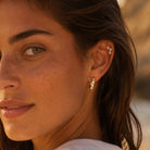 Gouden earcuff met steentjes ster Marina Star