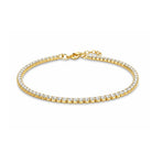 Gouden tennisarmband met witte steentjes 
