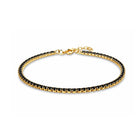 Gouden tennisarmband met zwarte steentjes 