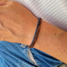 Leren armbandje met blauw bruin leren koord