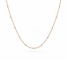 Rosé gouden bolletjesketting