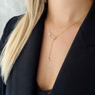 Veiligheidsspeld ketting met hanger en steentjes - dames kettinkje goud kleur safety pin goldfilled