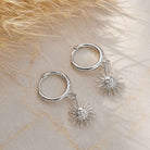 Zilver Oorbellen met zon hanger