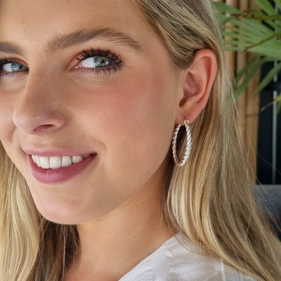 Zilveren oorbellen ovaal met spiraal model Lolita