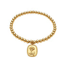 Gouden bolletjes armband roos