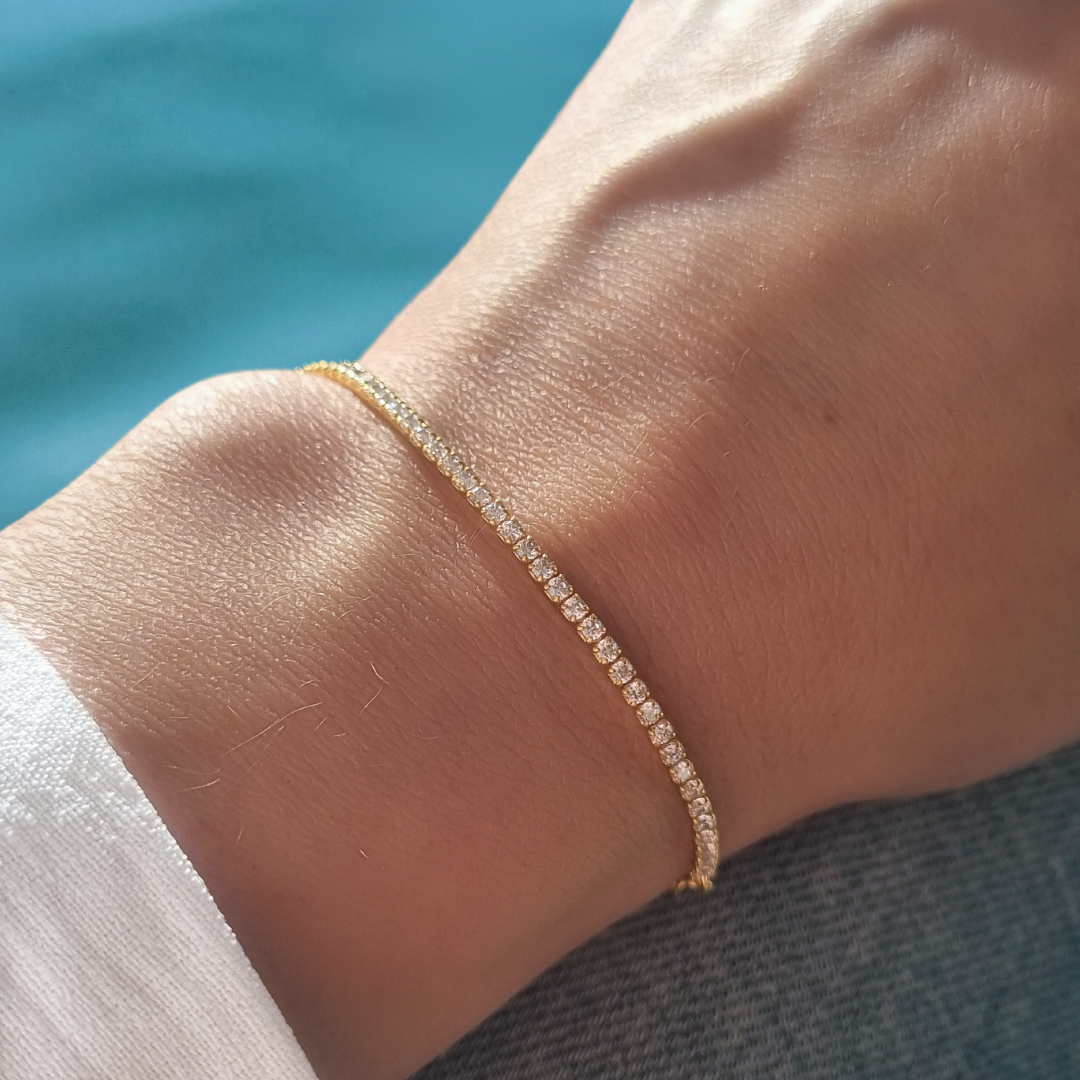 Gouden tennisarmband vrouw met witte steentjes Grace