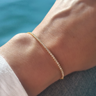 Gouden tennisarmband vrouw met witte steentjes Grace